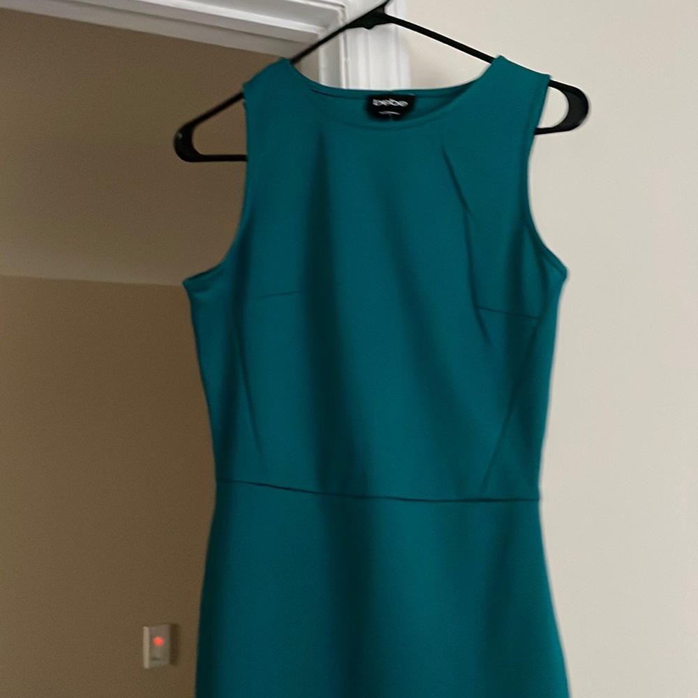 New w/o tags. Never worn. Kelly green dress by Bebe